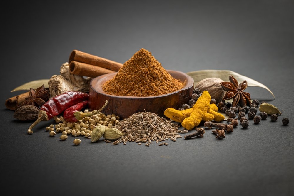 garam masala and Indian curry spices with black background